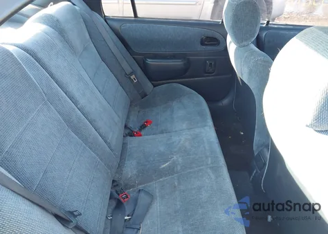 1997 Toyota Corolla Dx z USA, uszkodzony, nr VIN 1NXBB02E9VZ513481